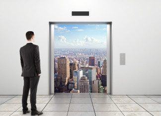 Elevator Pitch - Man Looking Out To City